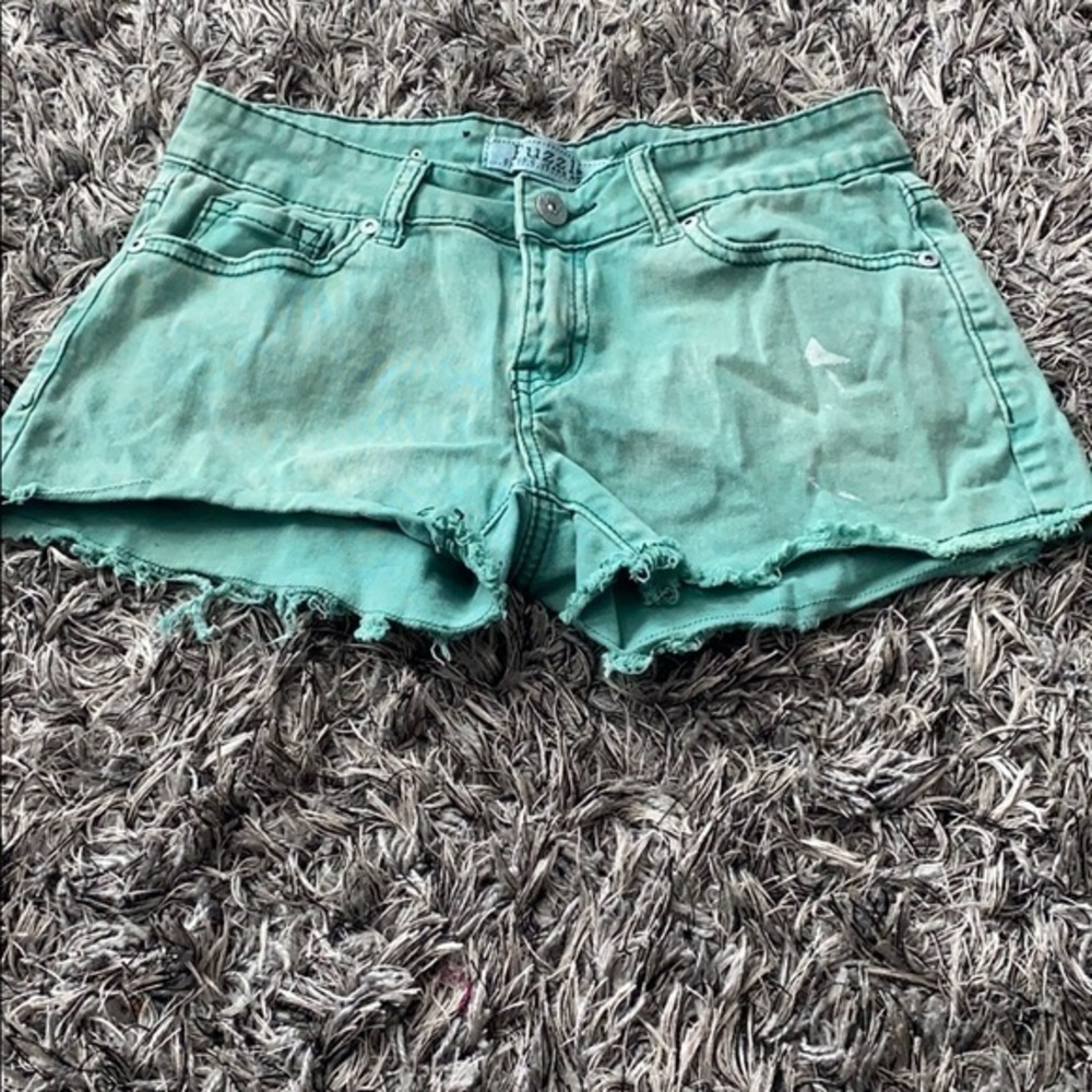 Distressed green denim shorts Puzzle size 3.